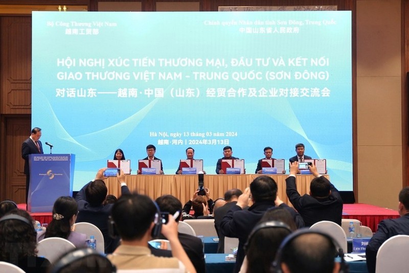 Conferencia sobre la promoción del comercio y las inversiones entre Vietnam y la provincia china de Shandong. (Foto: VNA)