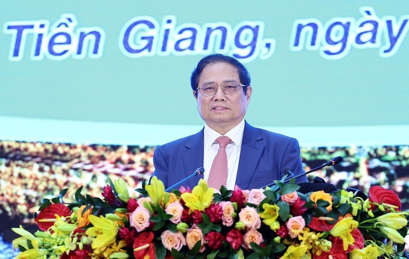 El primer ministro Pham Minh Chinh en una conferencia para anunciar la planificación de Tien Giang (Foto: VNA)