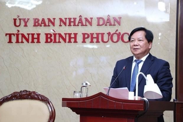 El vicepresidente del Comité Popular de Binh Phuoc, Tran Van Mi, interviene en el evento. (Fotografía: VNA)