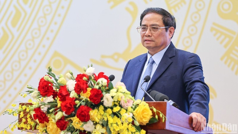 El primer ministro Pham Minh Chinh en la teleconferencia. (Fotografía: Nhan Dan)