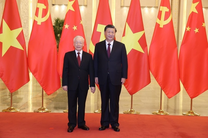 El secretario general del Partido Comunista de Vietnam (PCV), Nguyen Phu Trong, y el secretario general del Partido Comunista (PCCh) y presidente de China, Xi Jinping, en noviembre de 2022. (Fotografía: VNA)