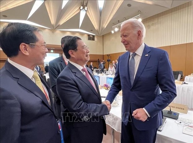 El primer ministro de Vietnam, Pham Minh Chinh, y el presidente de Estados Unidos, Joe Biden. (Foto: VNA)