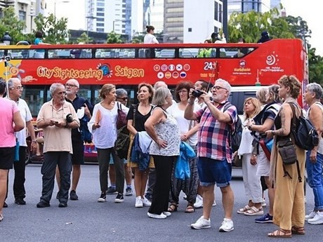 Turistas extranjeros visitan Ciudad Ho Chi Minh. (Foto: doanhnhansaigon.vn)