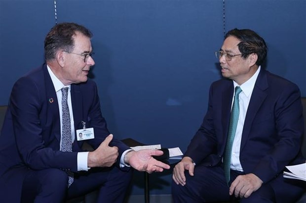 El Primer Ministro Pham Minh Chinh recibe al director general de ONUDI, Gerd Müller. (Foto: VNA)