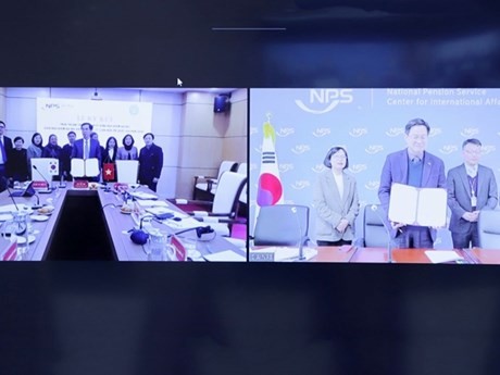 La firma en línea entre el Seguro Social de Vietnam y el Servicio Nacional de Pensiones de Corea del Sur. (Foto: dangcongsan.vn)