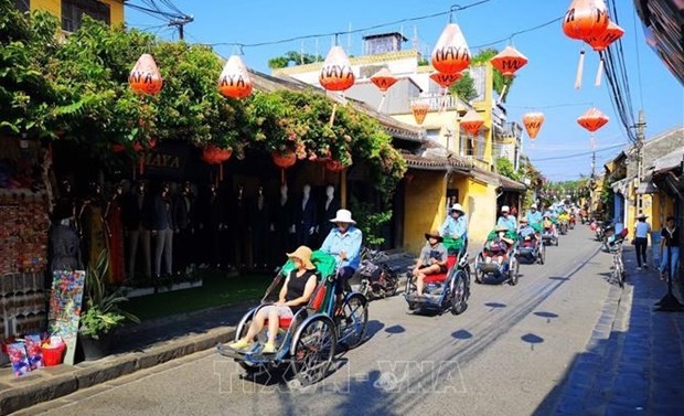 Turistas en Hoi An. (Foto: VNA)