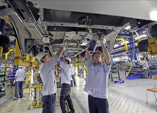 Producción de autos en la fábrica de ensamblaje de automóviles Ford Hai Duong. (Foto: VNA)
