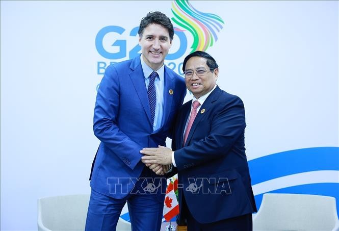 El primer ministro Pham Minh Chinh se reúne con su par canadiense, Justin Trudeau. (Foto: VNA)