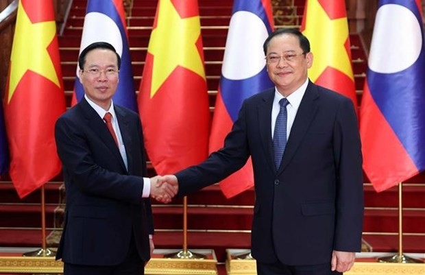 El presidente de Vietnam, Vo Van Thuong, y el primer ministro de Laos, Sonexay Siphandone (Foto: VNA)