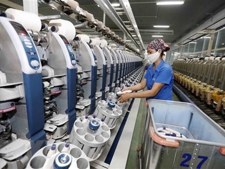 La compañía textil de Hoa Xa, de la Corporación de Confección Textil de Nam Dinh, una de las unidades líderes de la industria en la producción de hilados para los mercados nacionales y de exportación. (Foto: VNA)