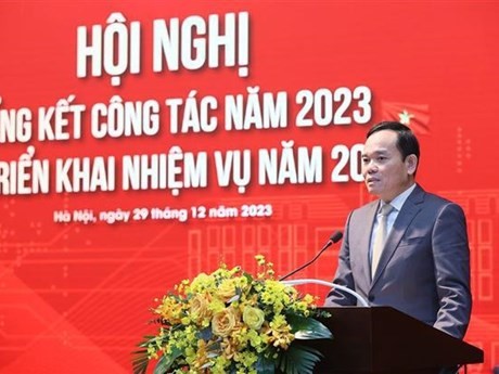 El viceprimer ministro de Vietnam Tran Luu Quang habla en el evento (Fuente:VNA)