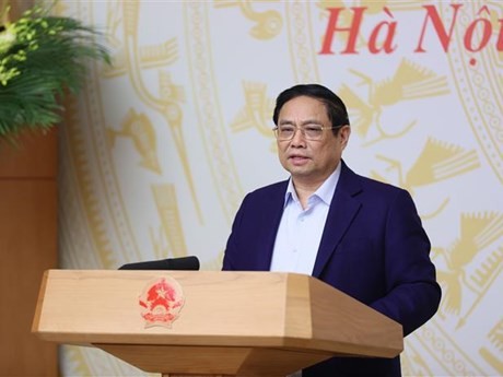 El primer ministro Pham Minh Chinh habla en la reunión (Foto: VNA)