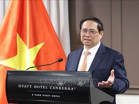 El primer ministro de Vietnam, Pham Minh Chinh, interviene en el encuentro. (Foto: VNA)