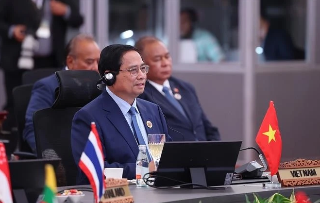El primer ministro de Vietnam, Pham Minh Chinh, interviene en la cita. (Fotografía: VNA)