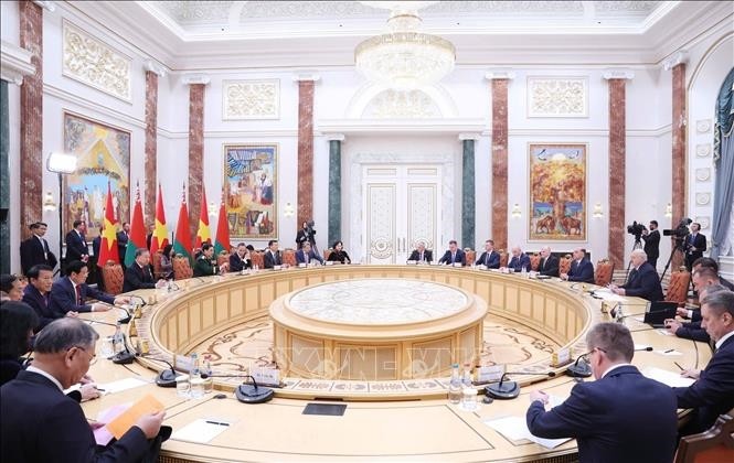 En la reunión entre el secretario general To Lam y el presidente Lukashenko (Foto: VNA)