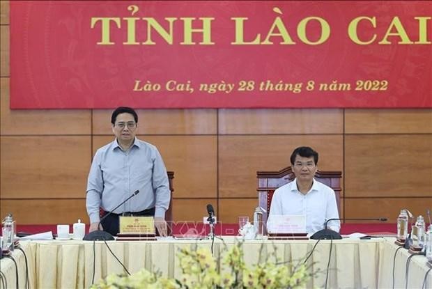 El primer ministro de Vietnam, Pham Minh Chinh, en la reunión de trabajo en Lao Cai. (Fotografía: VNA)