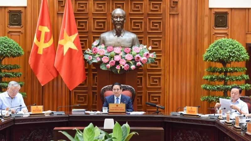 El primer ministro Pham Minh Chinh preside la reunión, (Foto: Nhan Dan)
