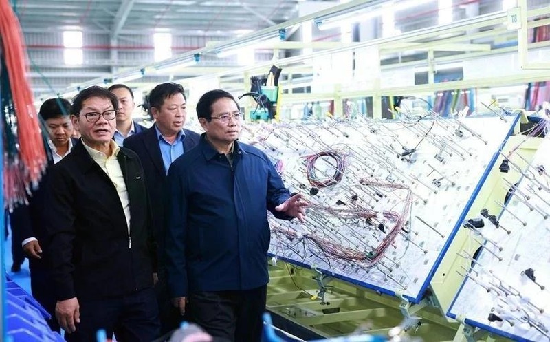 El primer ministro de Vietnam, Pham Minh Chinh, visitó una empresa en la provincia de Quang Nam en febrero. (Fuente: VNA)