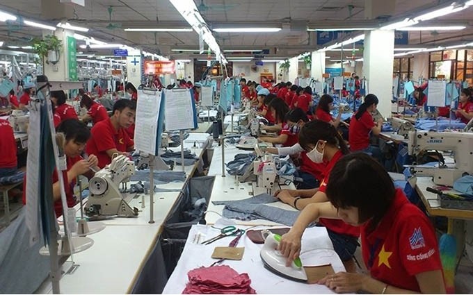 Las industrias de confecciones textiles, café y calzado todavía tienen un gran potencial. (Fotografía: nhandan.com.vn)