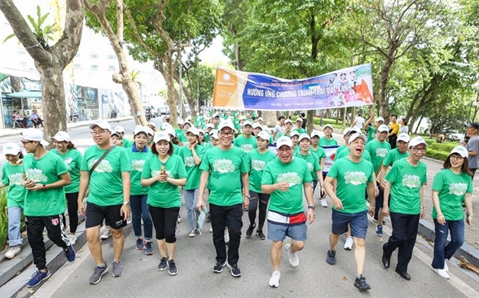 Participantes en el evento. (Fotografía: baovanhoa.vn/Cam Lai)