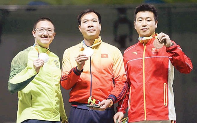 Hoang Xuan Vinh ganó la primera medalla olímpica para el deporte vietnamita 