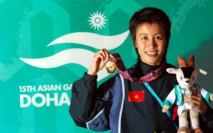 Vu Thi Nguyet Anh con su medalla de oro en el 15º Juegos Asiáticos. (Fuente: thethaovanhoa.vn)