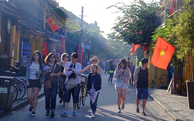 Turistas extranjeros en Hoi An antes del coronavirus.