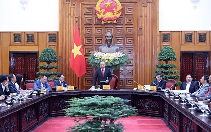 El miembro del Buró Político y viceprimer ministro permanente, Truong Hoa Binh, interviene en el encuentro. (Fotografía: baochinhphu.vn)