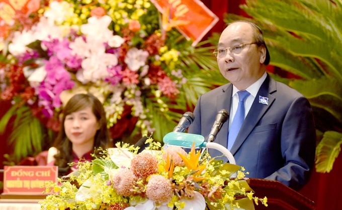 El primer ministro Nguyen Xuan Phuc da sus palabras en el Congreso. (Fotografía: Nhan Dan)