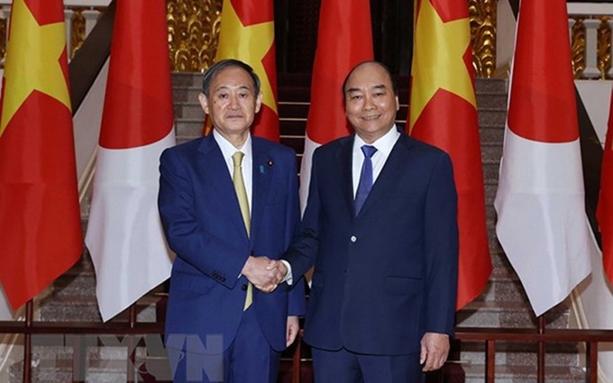 El primer ministro de Vietnam, Nguyen Xuan Phuc, y su homólogo japonés, Suga Yoshihide. (Fotografía: VNA) 