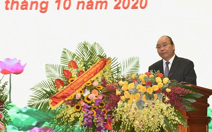 El primer ministro Nguyen Xuan Phuc habla en el evento. (Fotografía: Nhan Dan)