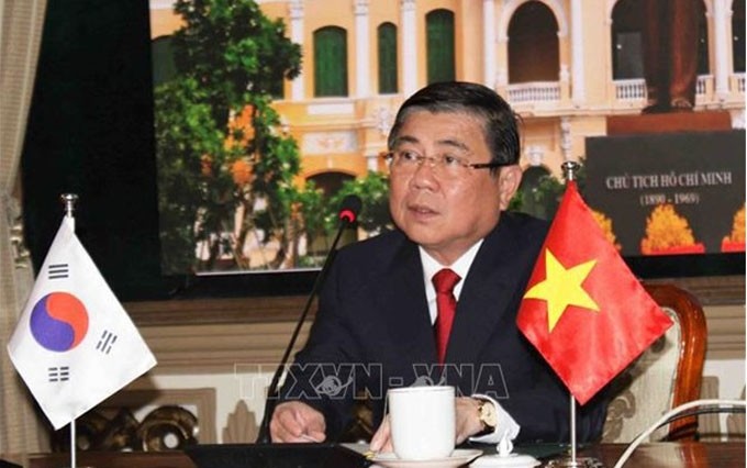Nguyen Thanh Phong, presidente del Comité Popular de Ciudad Ho Chi Minh, en la reunión (Foto: VNA)