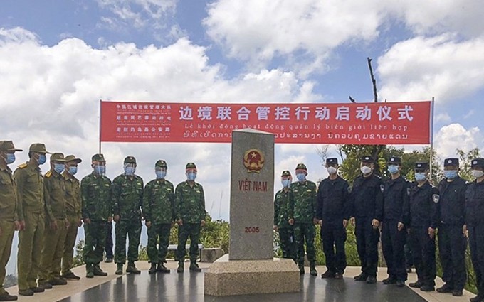 El encuentro entre las tropas de guardia fronteriza de Vietnam, China y Laos. (Fotografía: laodong.vn)