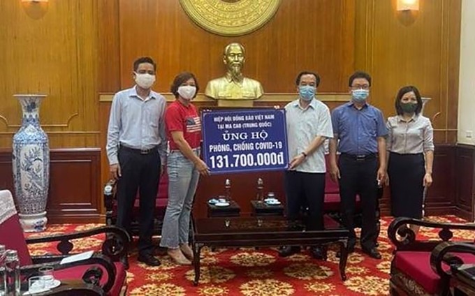 Asociación de Vietnamitas en Macao (China) apoya lucha contra Covid-19 en país de origen (Fotografía: thoidai.com.vn)