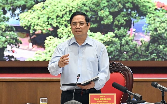 El primer ministro de Vietnam, Pham Minh Chinh, habla en la reunión. (Fotografía: Nhan Dan)