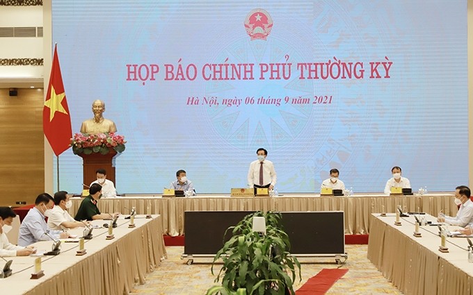 Escena de la conferencia de prensa (Fotografía: baochinhphu.vn)