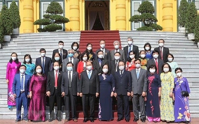 El presidente vietnamita, Nguyen Xuan Phuc y los delegados en el evento. (Fotografía: VNA) 