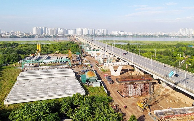 Sitio de construcción del puente de Vinh Tuy 2 desde arriba. (Fotografía: Nhan Dan)