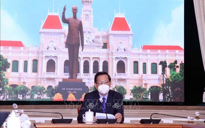 El presidente del Comité Popular de Ciudad Ho Chi Minh, Phan Van Mai, en la reunión. (Fotografía: VNA)