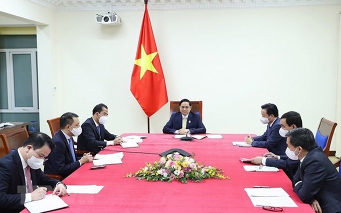 El primer ministro de Vietnam, Pham Minh Chinh, en la conversación. (Fotografía: VNA)