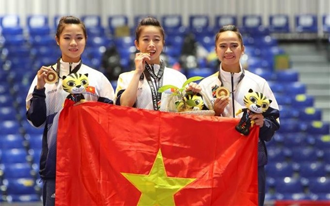 La atleta de Taekwondo de Vietnam Chau Tuyet Van (medio) es elegida una de las 10 embajadoras deportivas de la Asean.