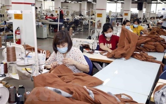  Productos textiles, uno de los rubros exportables principales a Laos (Fuente: VNA)