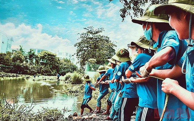 Jóvenes vietnamitas en una actividad comunitaria. (Fotografía: Nhan Dan)