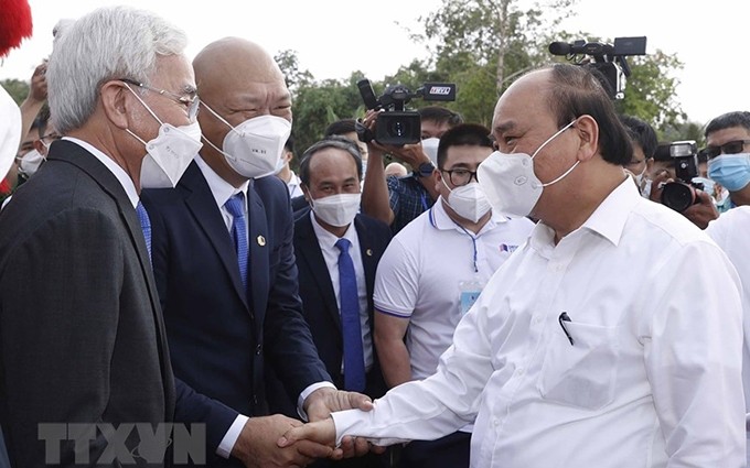 El presidente Nguyen Xuan Phuc (derecha) en el evento. (Fotografía: VNA)