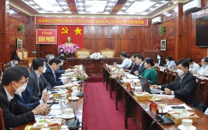 Escena de la reunión (Fuente: https://binhphuoc.gov.vn/)