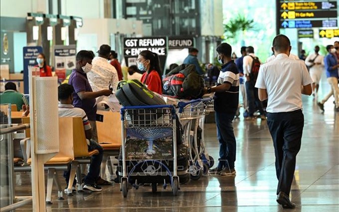 Turistas en el aeropuerto Changi, Singapur (Foto: VNA)