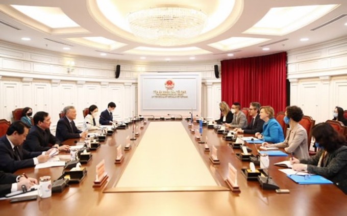 Escena de la reunión (Foto: VNA)