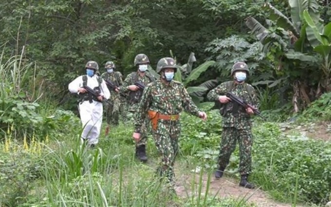 Las guardias fronterizas de la provincia vietnamita de Lao Cai y la localidad china de Yunnan efectúan patrulla conjunta (Foto: VNA)