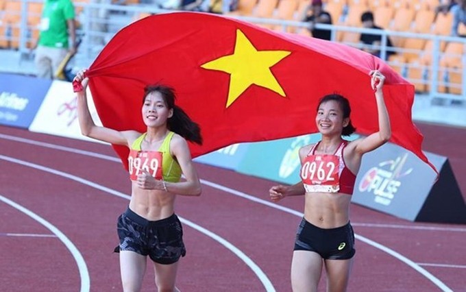 Atletas Nguyen Thi Oanh y Nguyen Thi Huyen. (Fotografía: VNA)