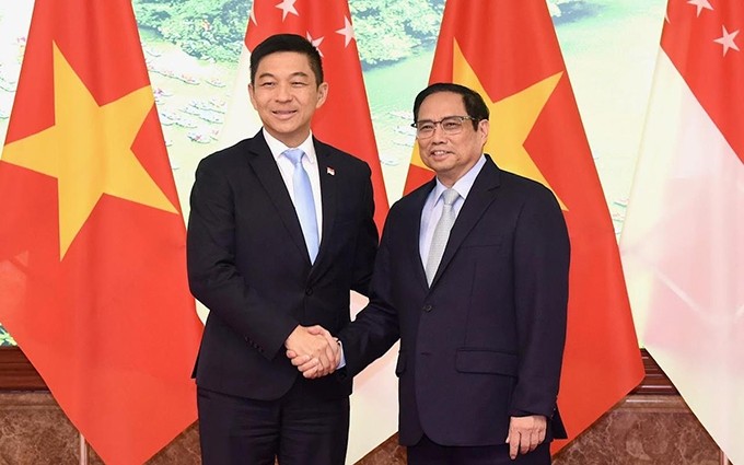 El primer ministro de Vietnam, Pham Minh Chinh, y el presidente del Parlamento de Singapur, Tan Chuan-Jin